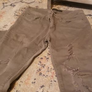 Girls distressed olive colored jeans